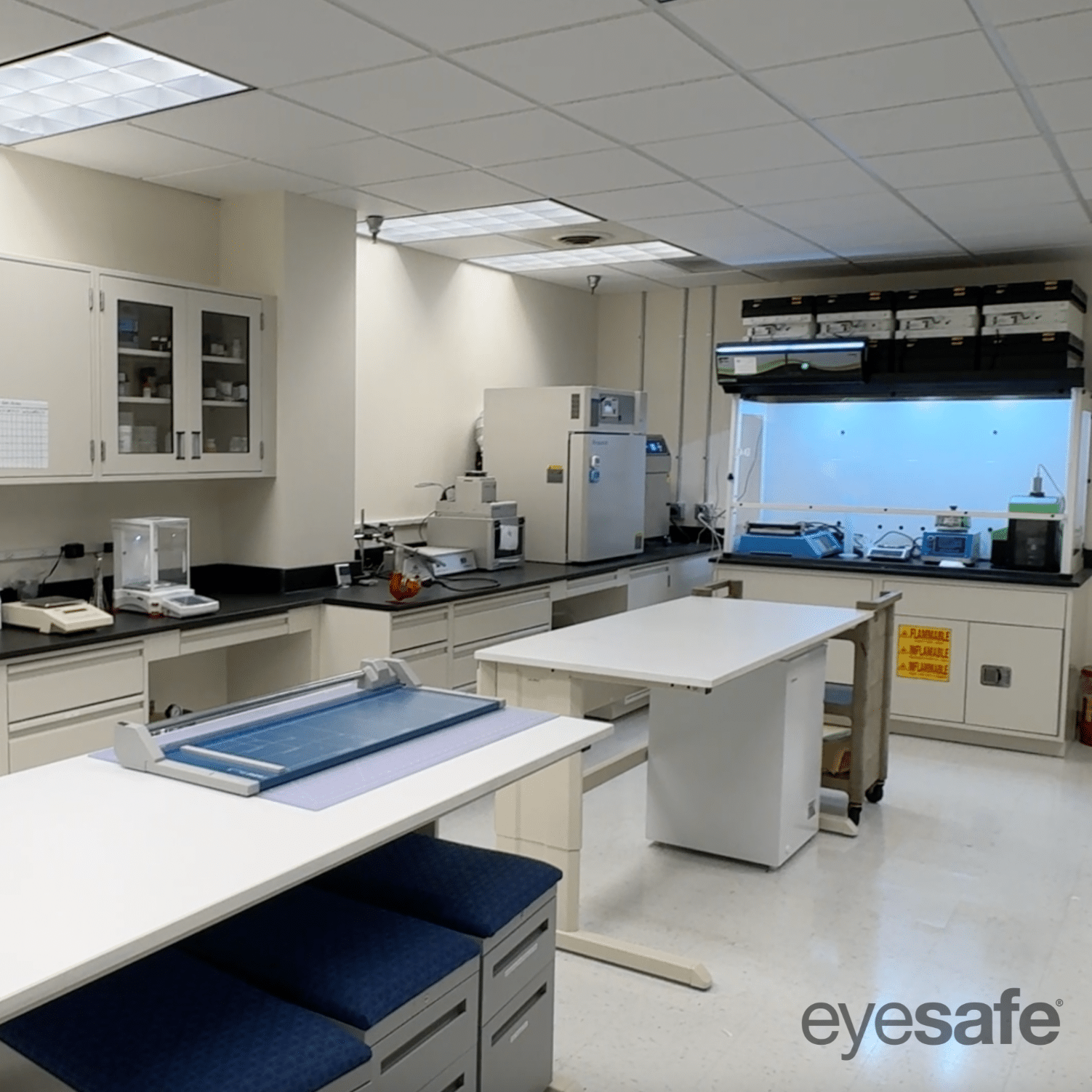 Laboratory workspace inside the Eyesafe® lab with equipment, worktables, and testing stations.